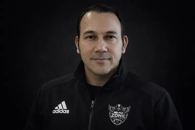 COACH MARTINEZ